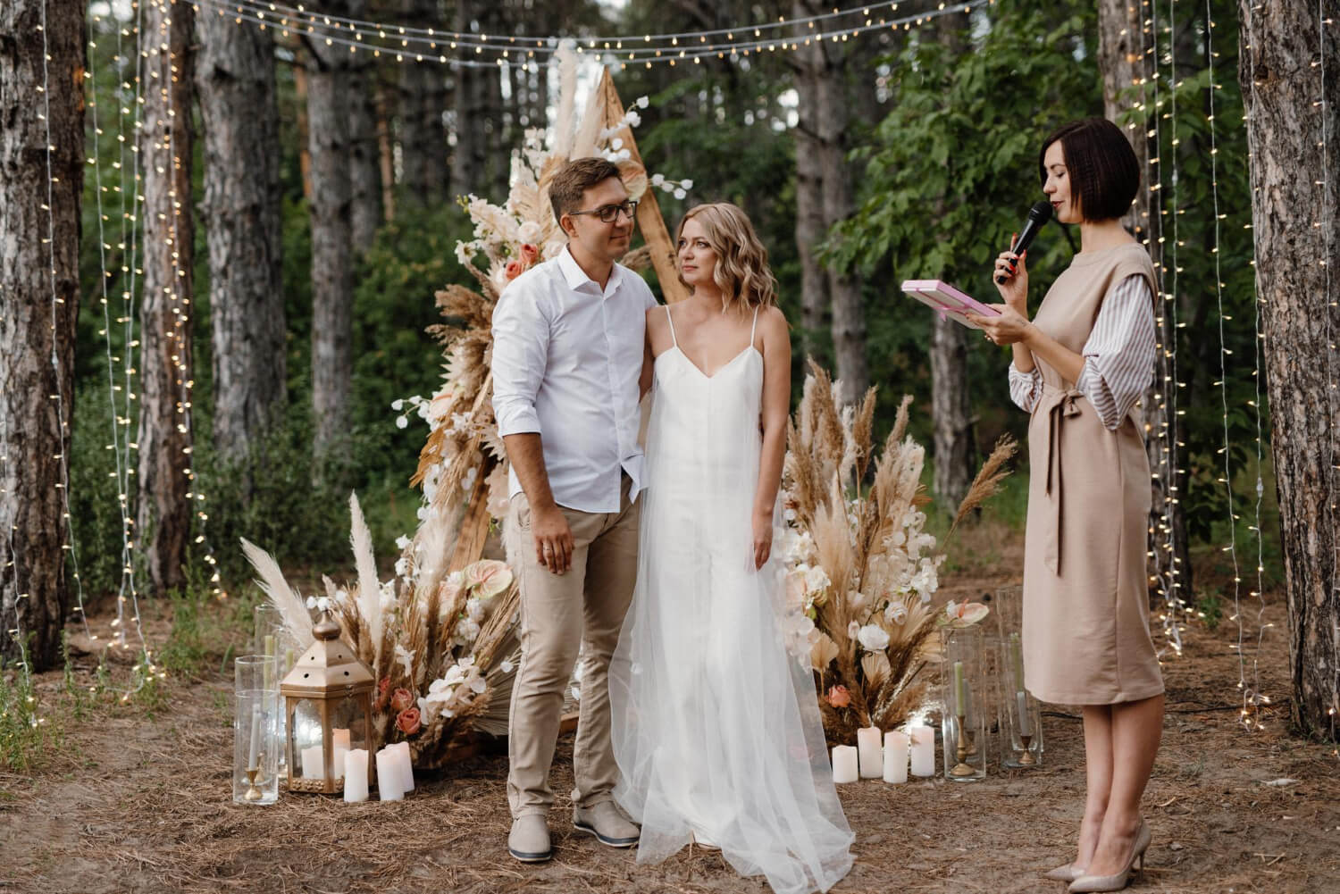 couple getting married in the woods