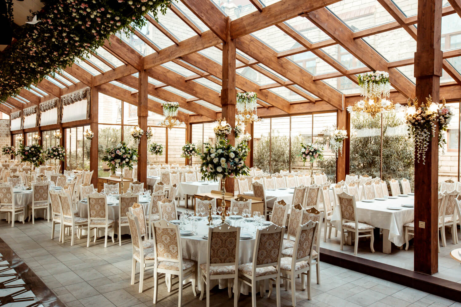 a restaurant adorned with flowers and furnished in the Rococo style