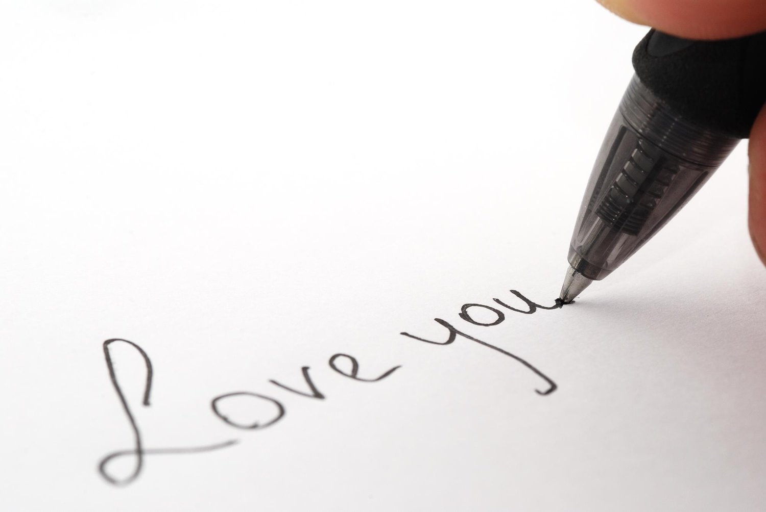 writing love you with a pen