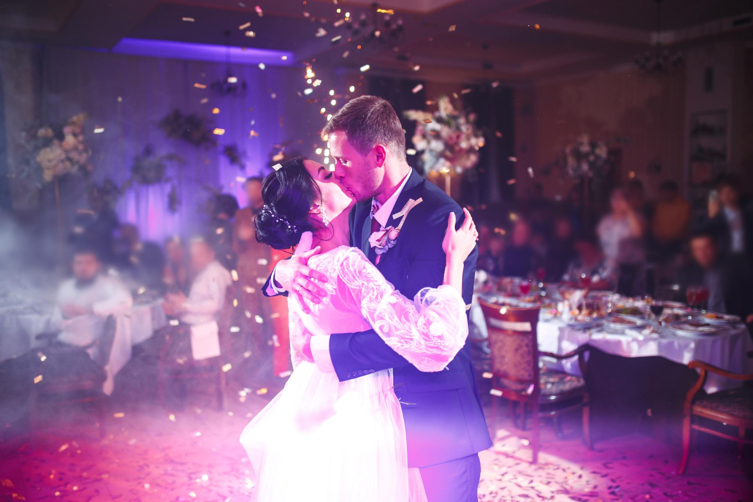 bride and groom kissing during the first dance on their wedding day