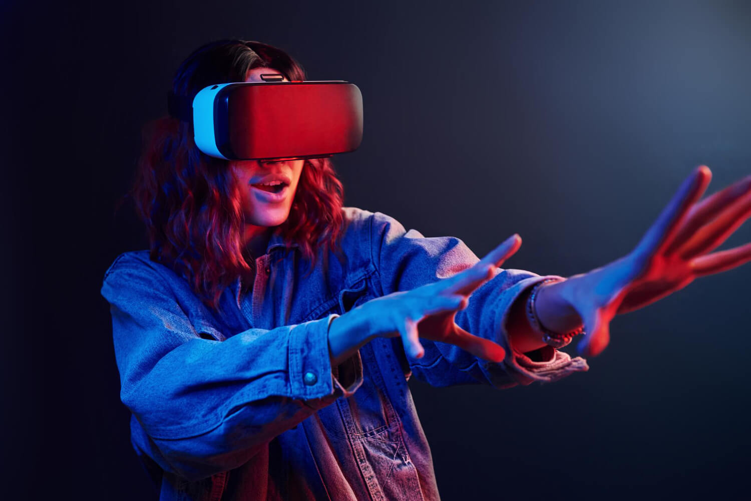 a woman using a virtual reality headset