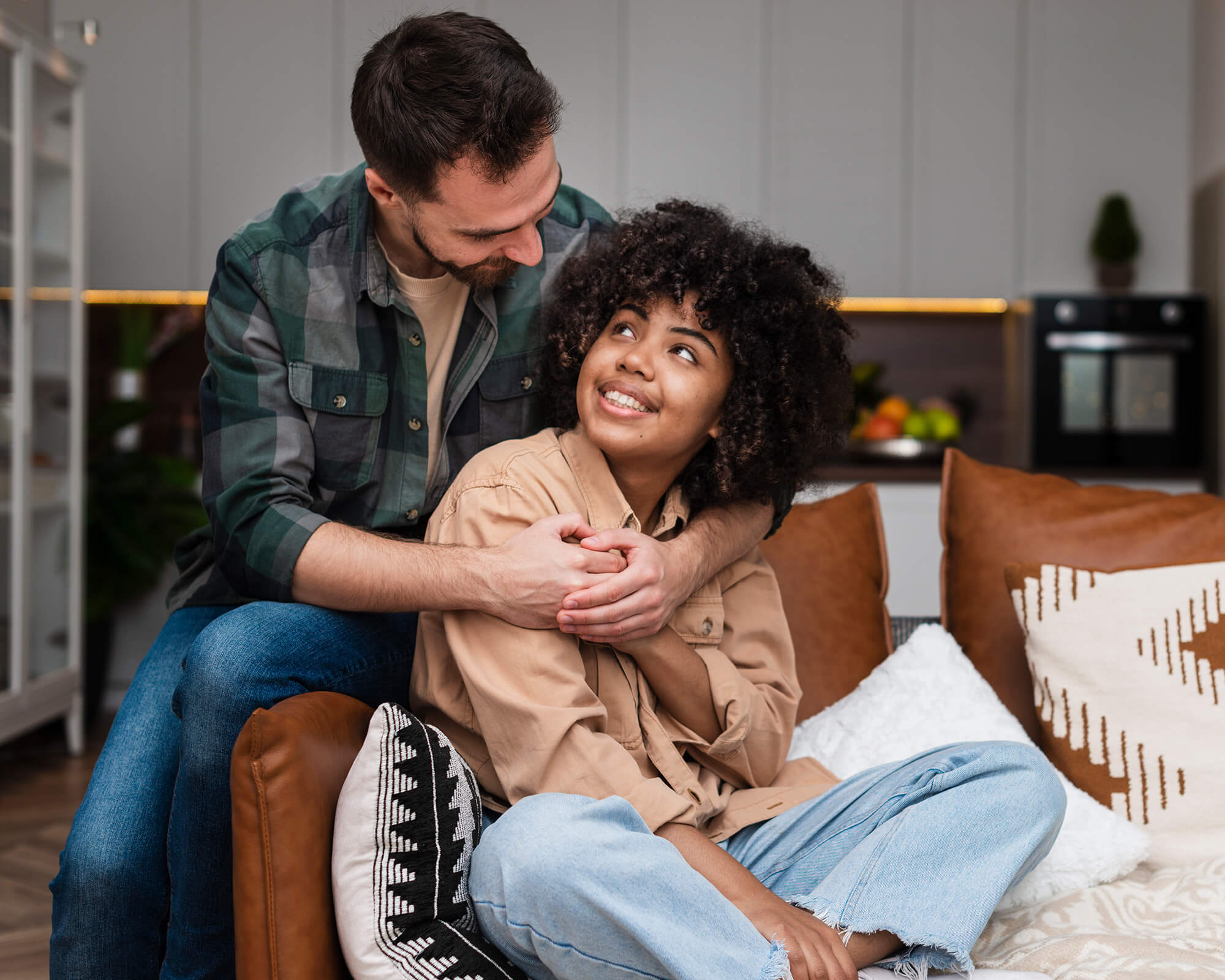 couple sitting on a couch together