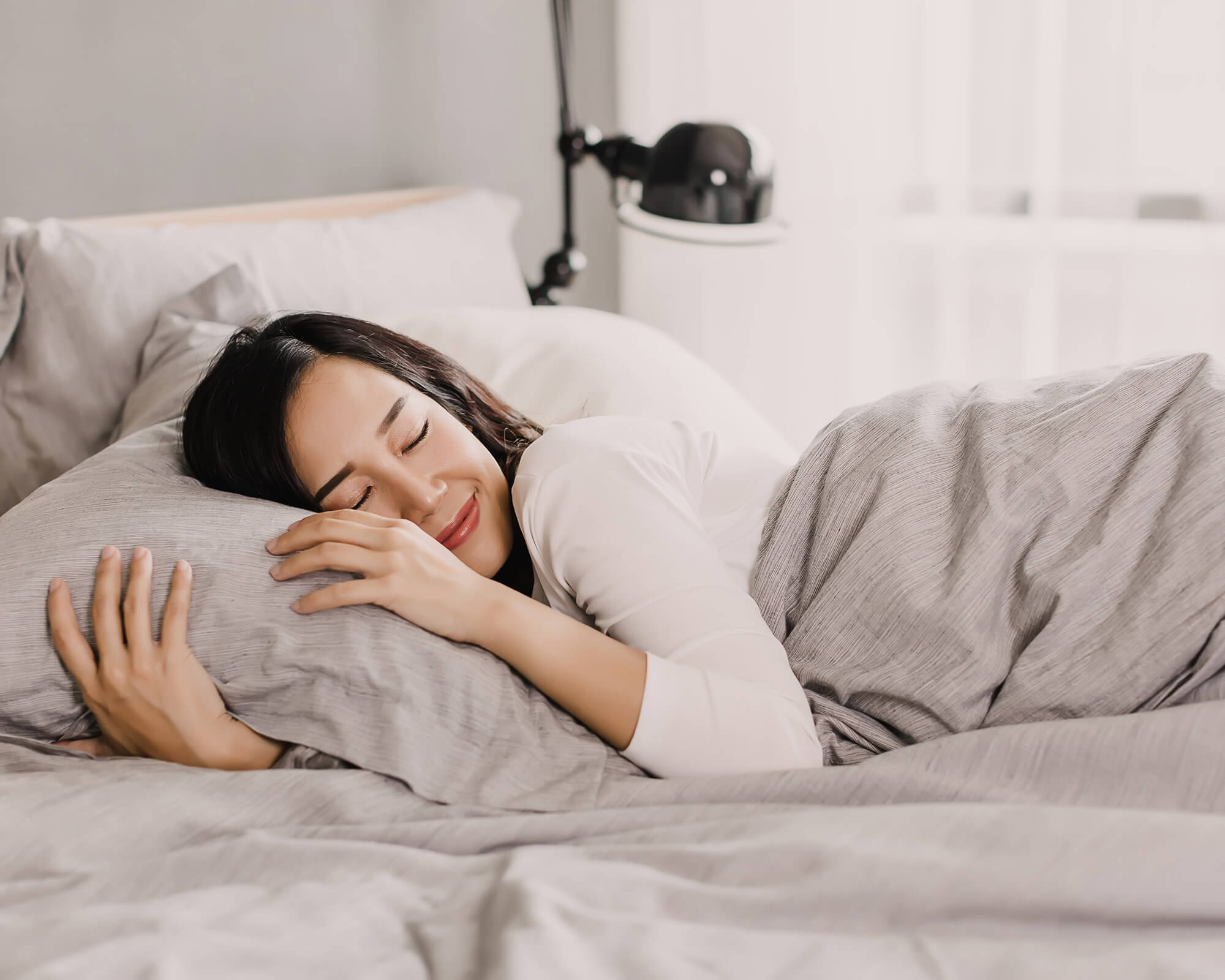 woman sleeping in a bed